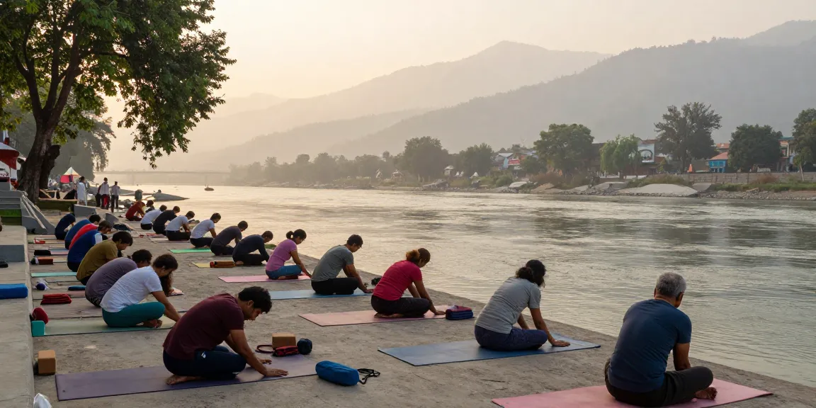 Yoga teacher training in Rishikesh, students practicing yoga poses by the Ganges River at sunrise.
